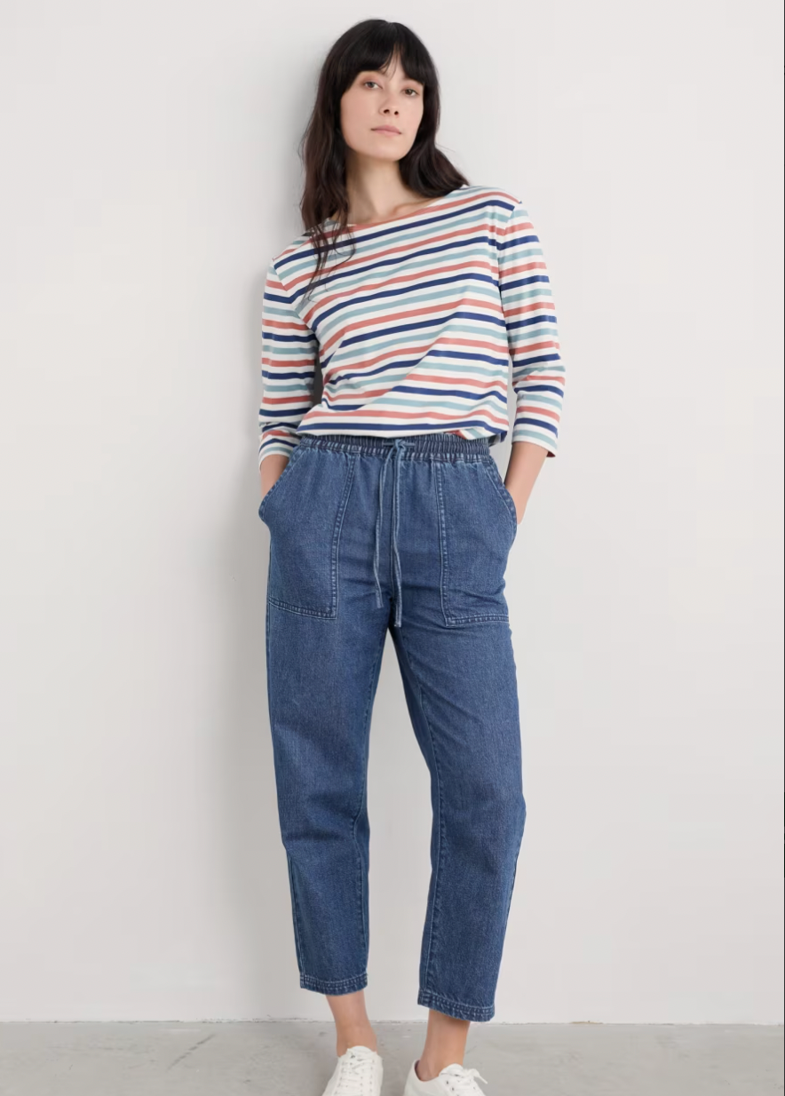 Woman wearing the Sailor striped top by SEASALT in Tri Mini Cornish Chalk Rose Dew