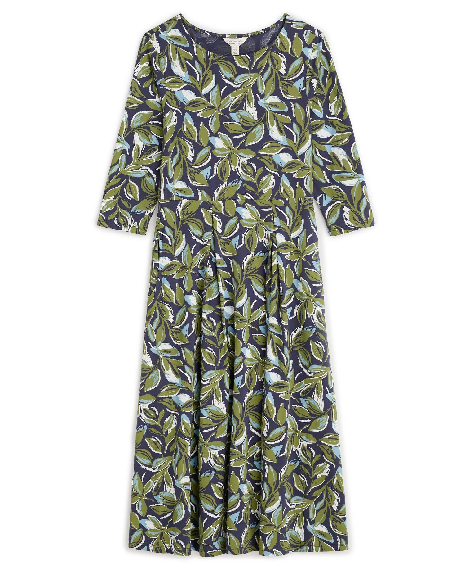 Flat lay of the Wild Bouquet floral Dress by SEASALT in green Leaves