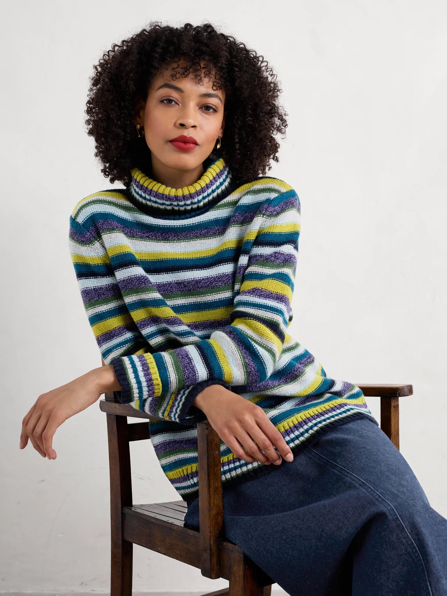 Woman wearing the Braque Striped Jumper in Concertina Dark Citron Multi by SEASALT