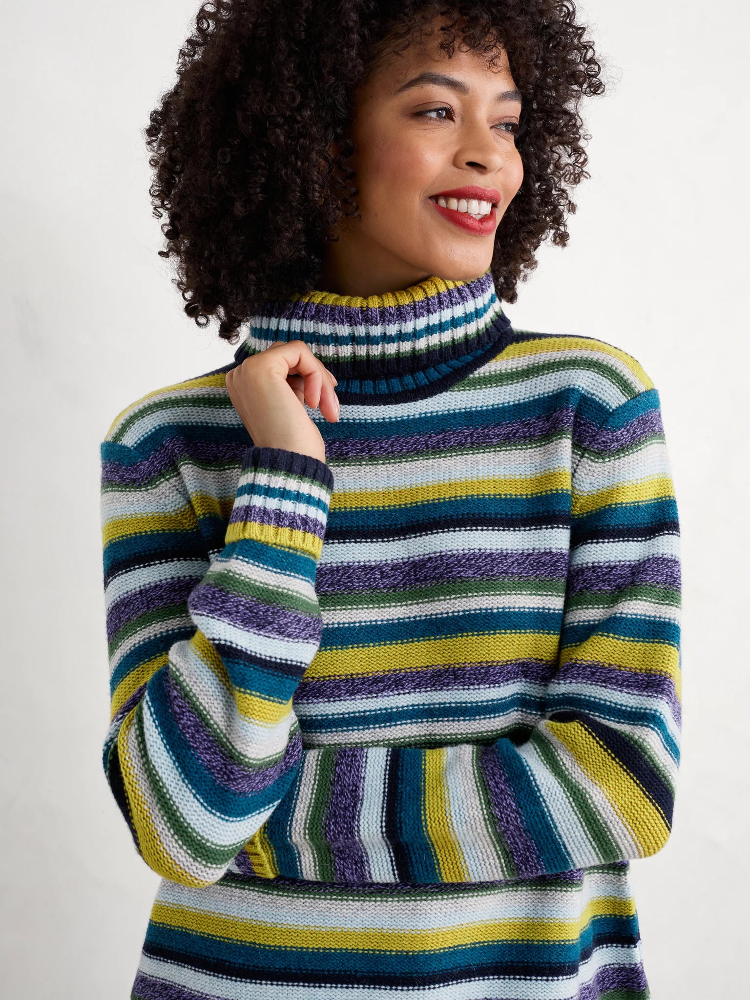 Woman wearing the Braque Striped wool Jumper in Concertina Dark Citron Multi by SEASALT