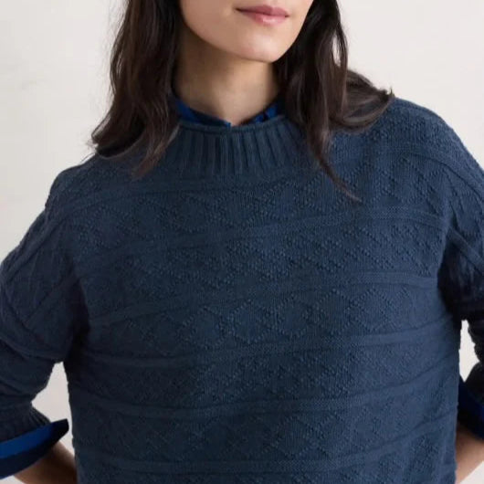 Woman wearing the the Penkestle cotton Jumper in Maritime navy by SEASALT