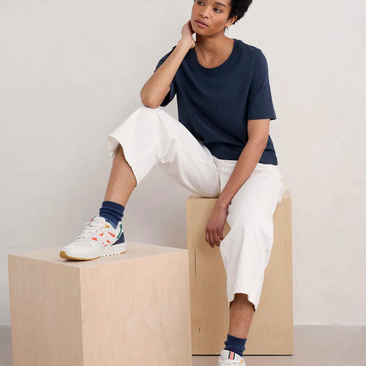 Woman wearing the cotton Copseland T-Shirt by SEASALT in Maritime navy