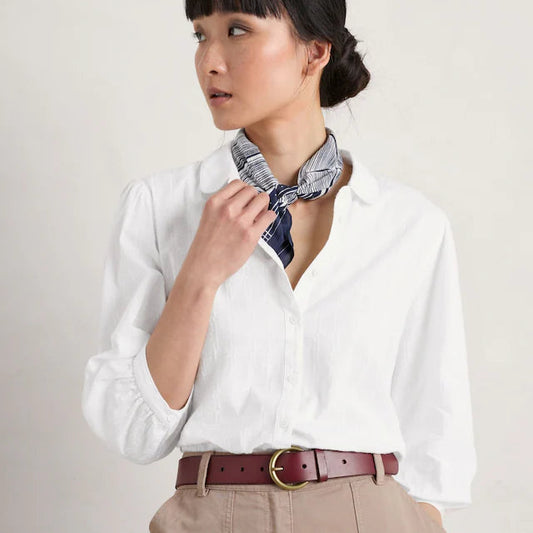 Woman wearing the Hope Cottage Blouse in Salt by SEASALT