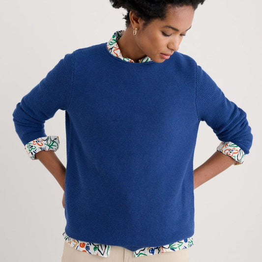 Woman wearing the Makers cotton Jumper by SEASALT in washed marine blue