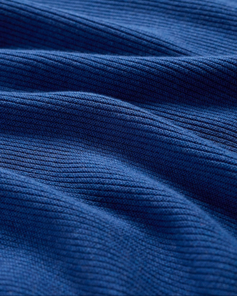 Close up of knitted cotton Makers Jumper by SEASALT in washed marine blue
