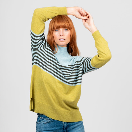 Woman wearing the Stripe & Colour block Jumper from Bridge and Lord in Citrine green and blue