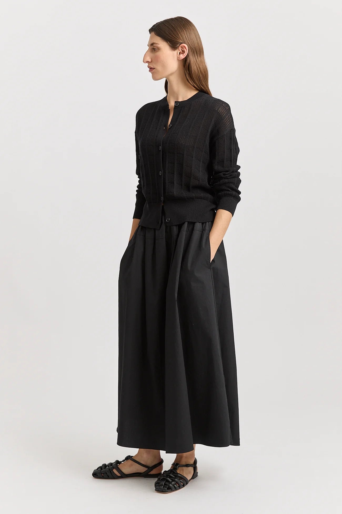 Woman wearing Toorallie's Open Stitch merino cotton Cardigan in Black