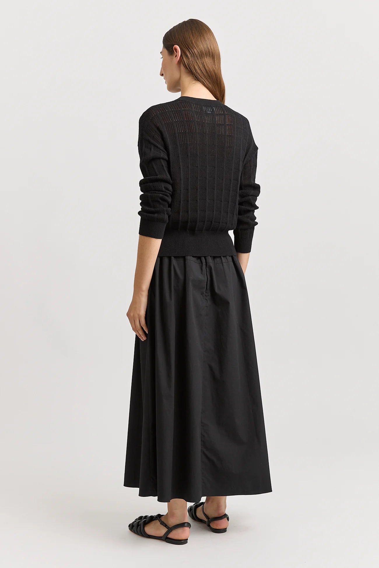 Woman wearing Toorallie's Open Stitch merino cotton Cardigan in Black