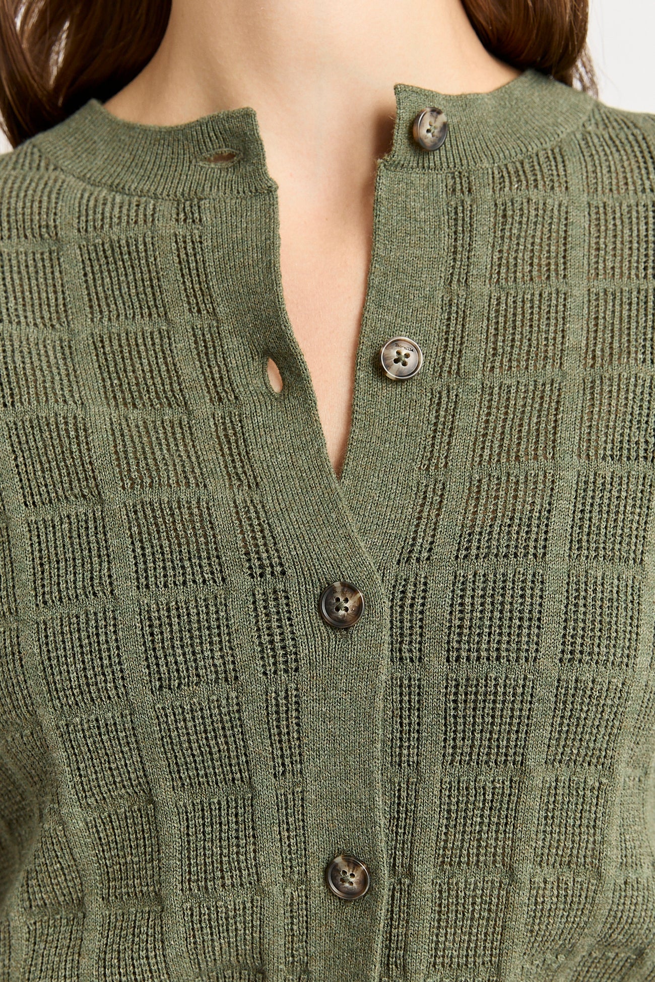 Woman wearing Toorallie's Open Stitch merino cotton Cardigan in Olive green