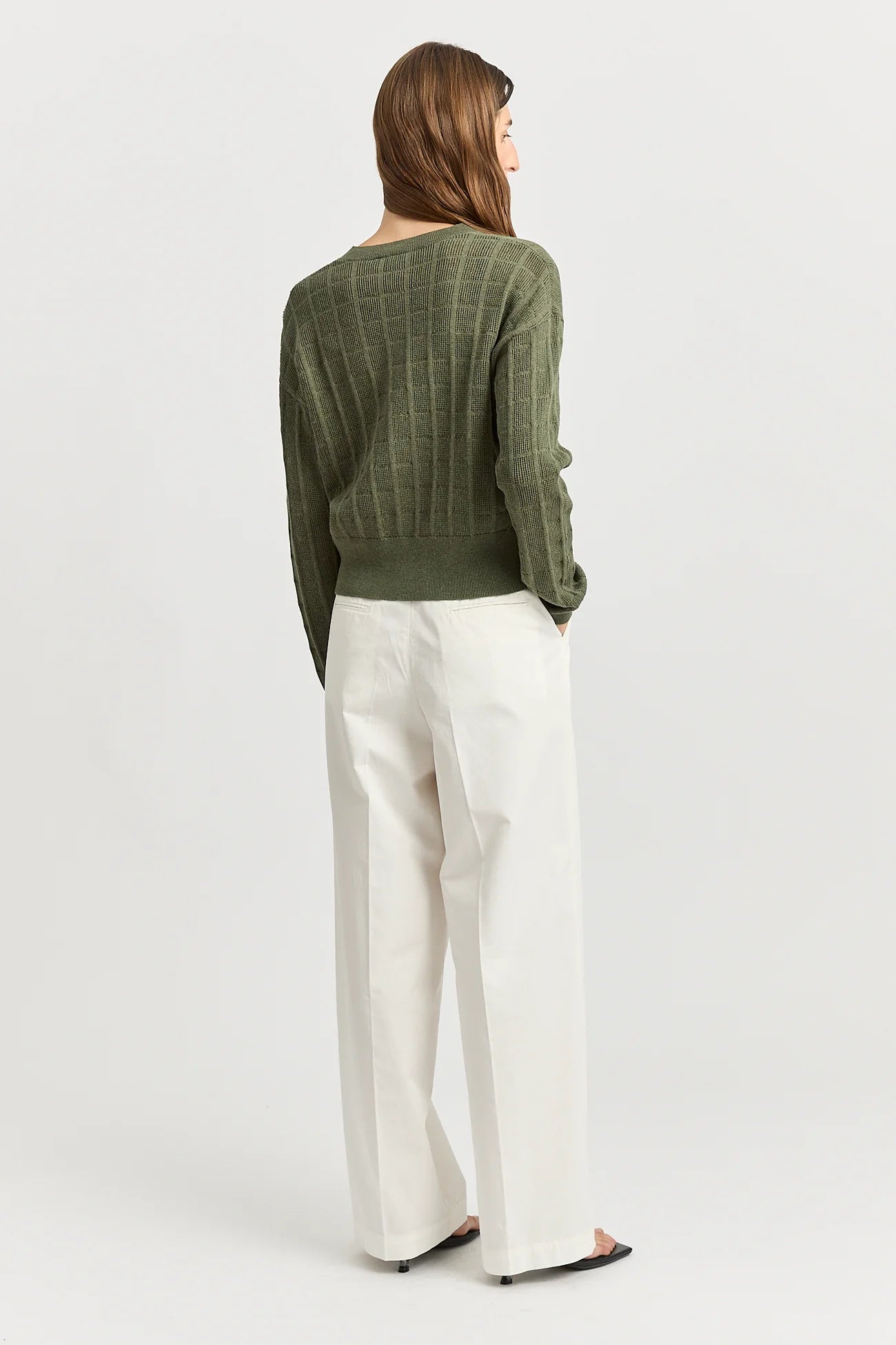 Woman wearing Toorallie's Open Stitch merino cotton Cardigan in Olive green