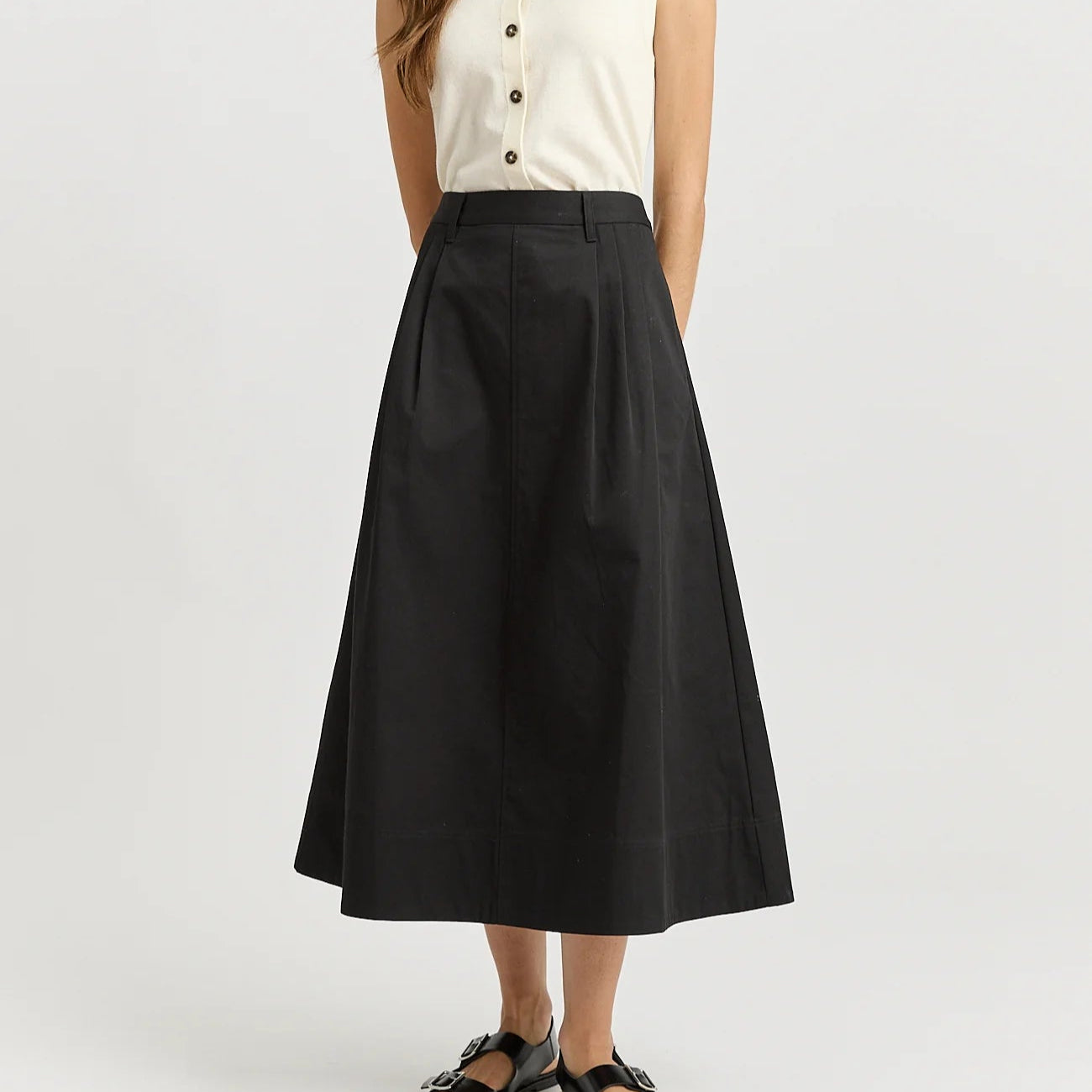 Woman wearing Toorallie's Pleat Detail cotton midi skirt in black