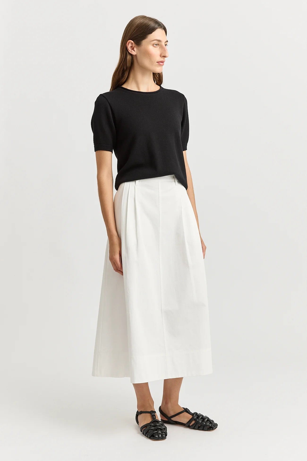 Woman wearing Toorallie's Pleat Detail Midi cotton Skirt in White