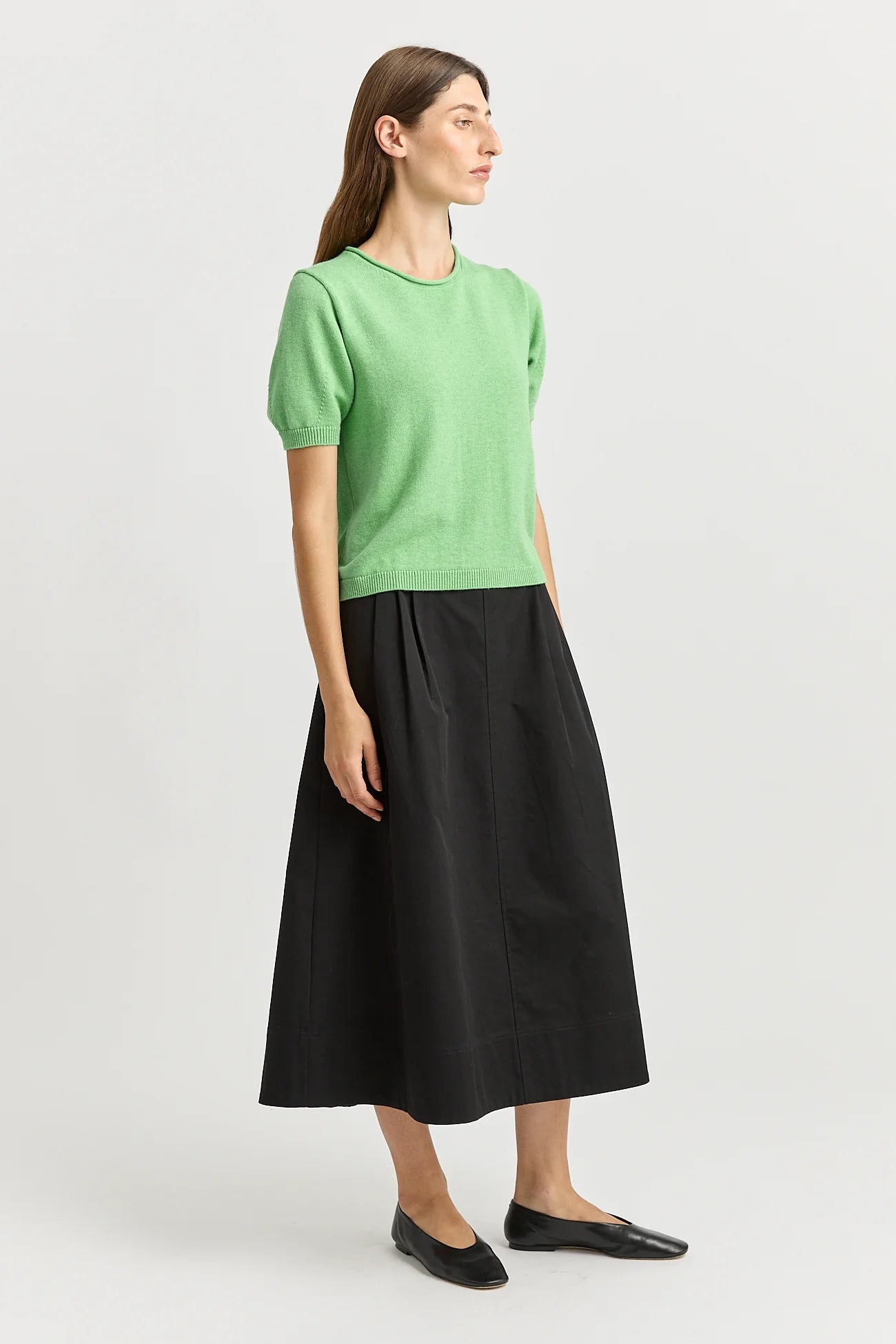Woman wearing Toorallie's Short Sleeve Knit cotton merino top in Agave green