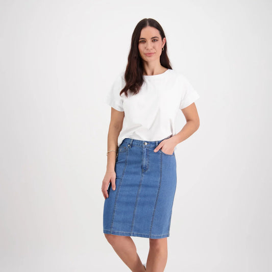 Woman wearing the denim skirt with contrasting cotton stitching by Vassalli in light blue