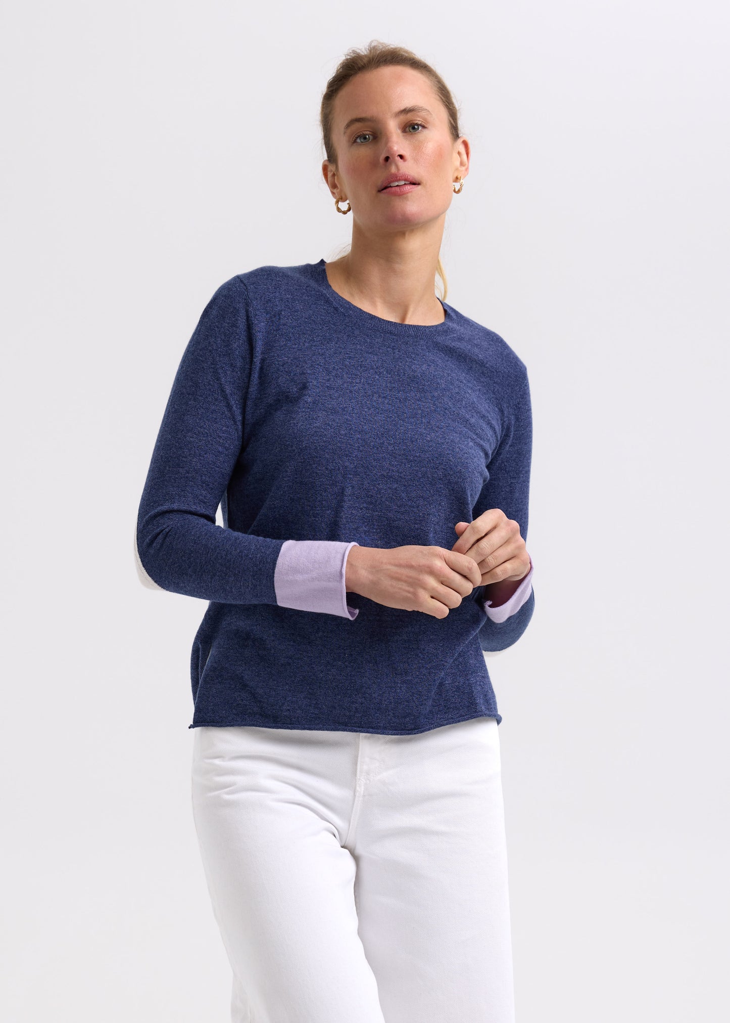 Woman wearing the Elbow Patch Jumper by Zaket and Plover in Denim navy