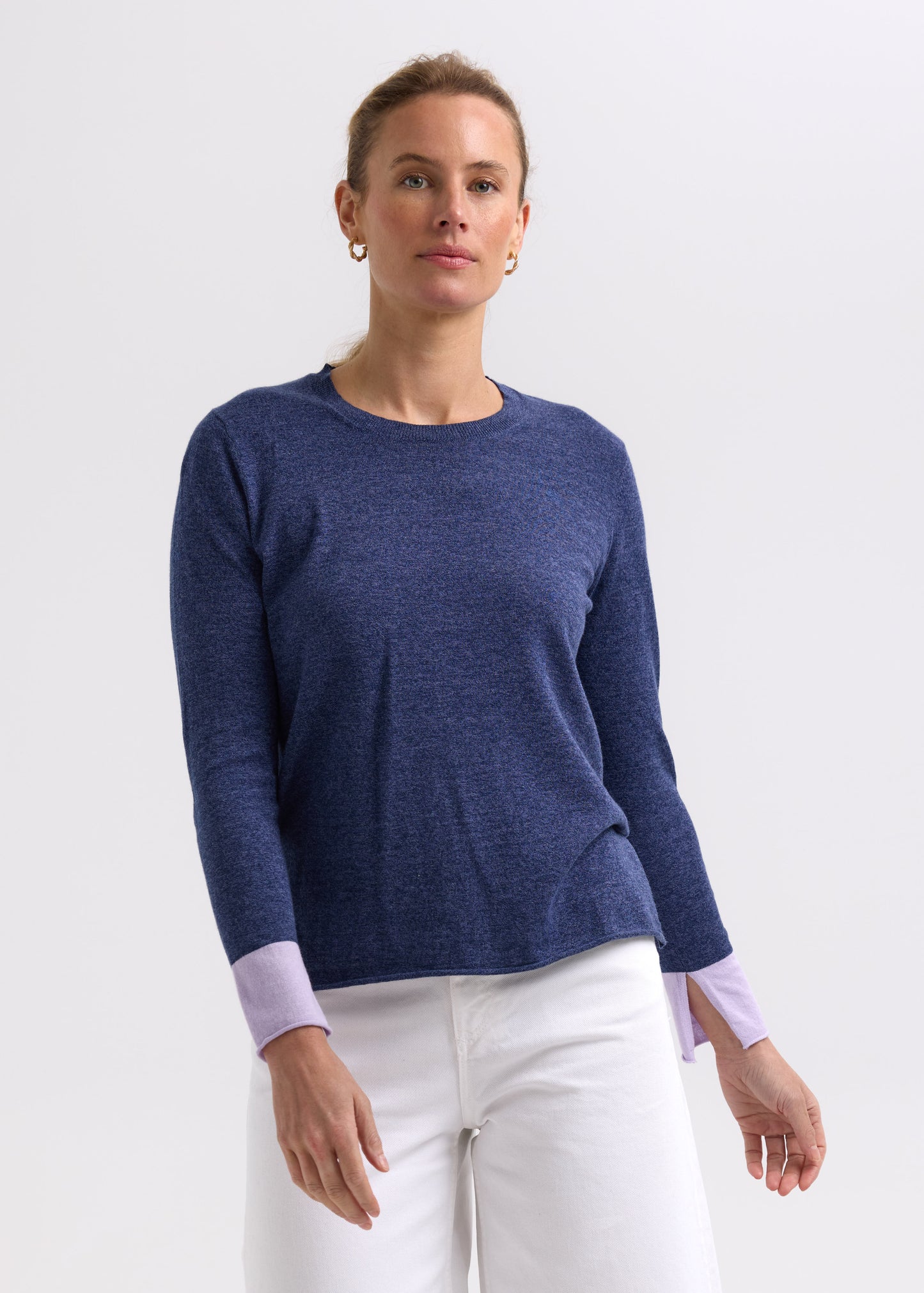 Woman wearing the Elbow Patch Jumper by Zaket and Plover in Denim navy