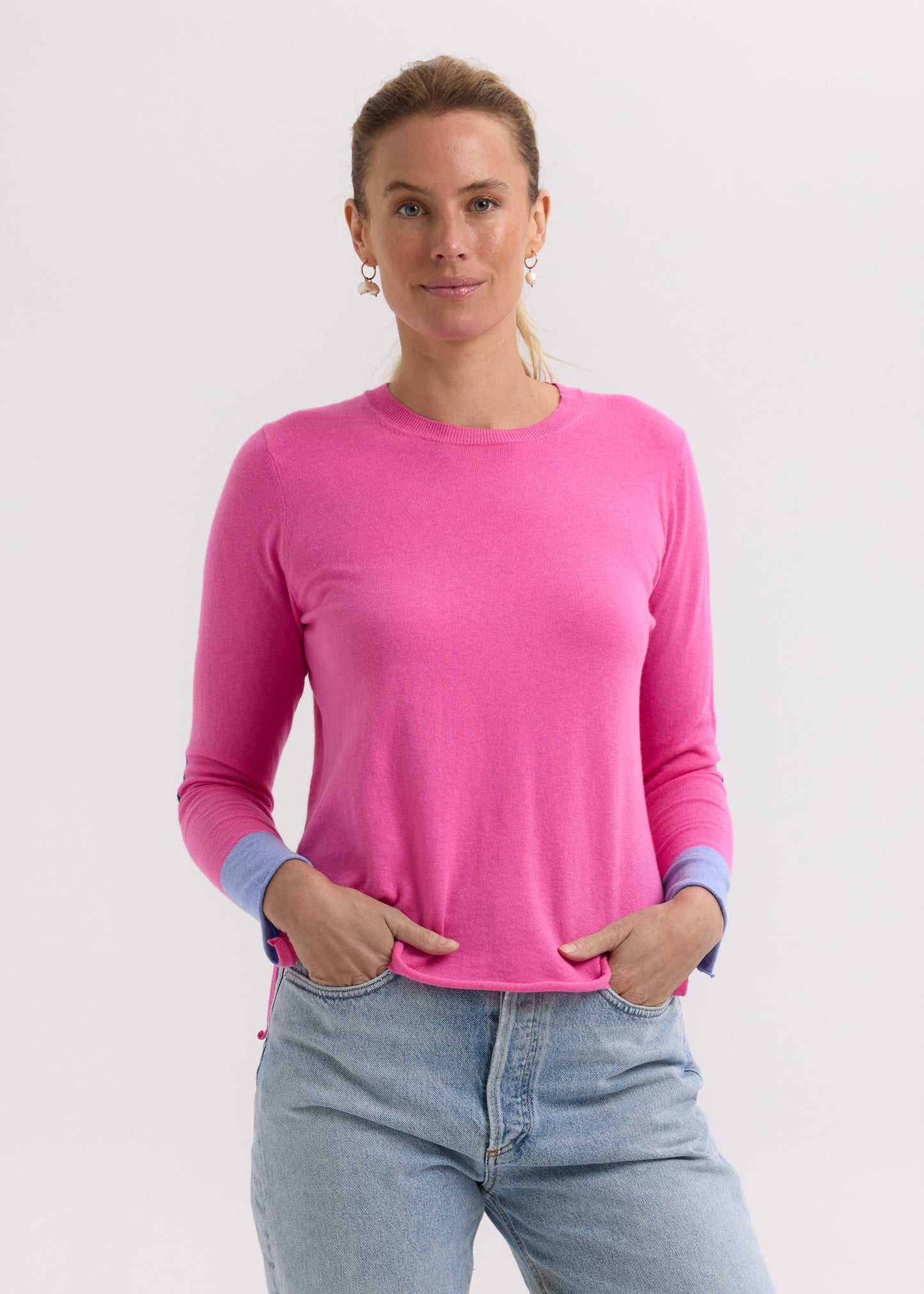 Woman wearing the Elbow Patch Jumper by Zaket and Plover in Pink