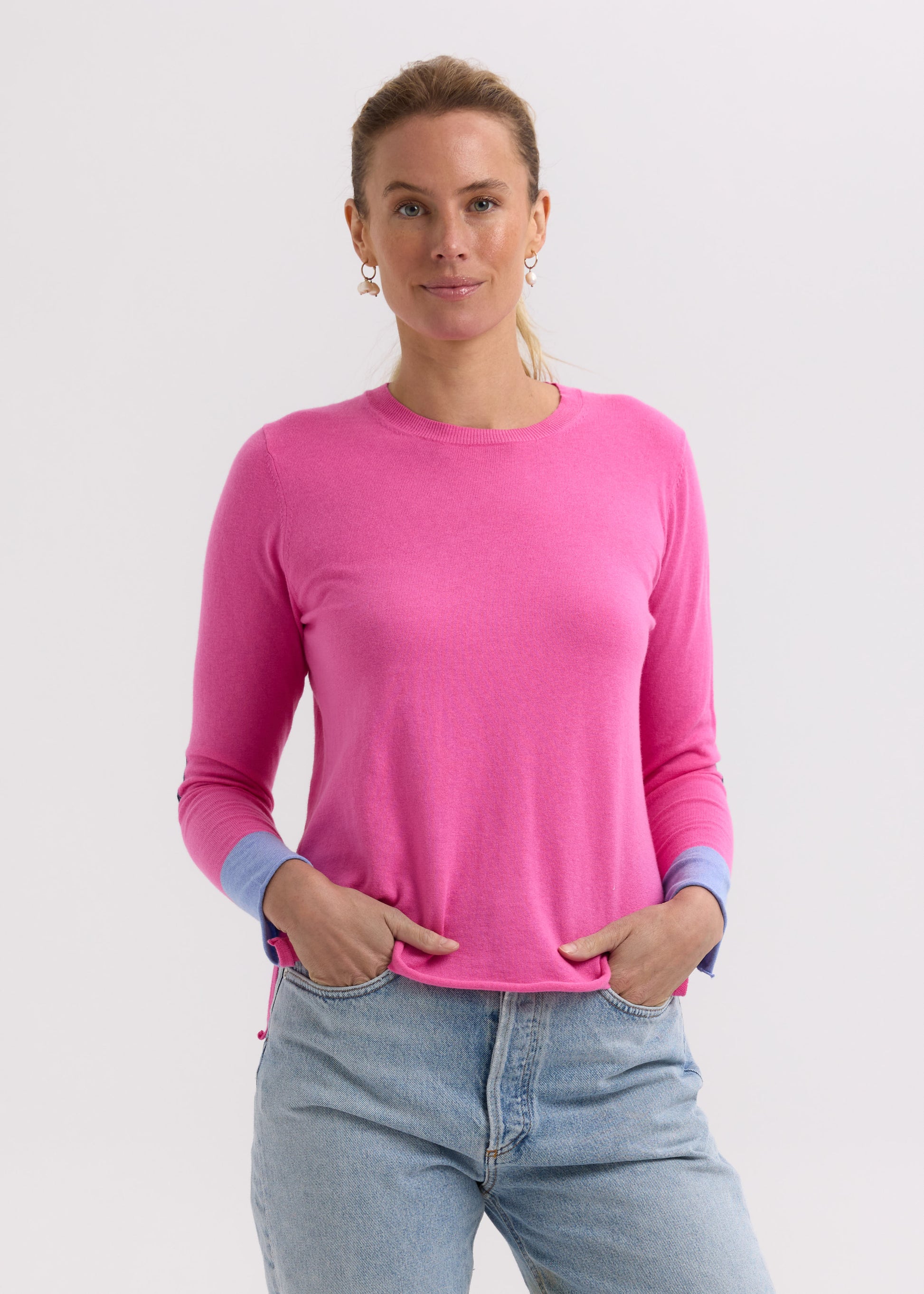 Woman wearing the Elbow Patch Jumper by Zaket and Plover in Pink