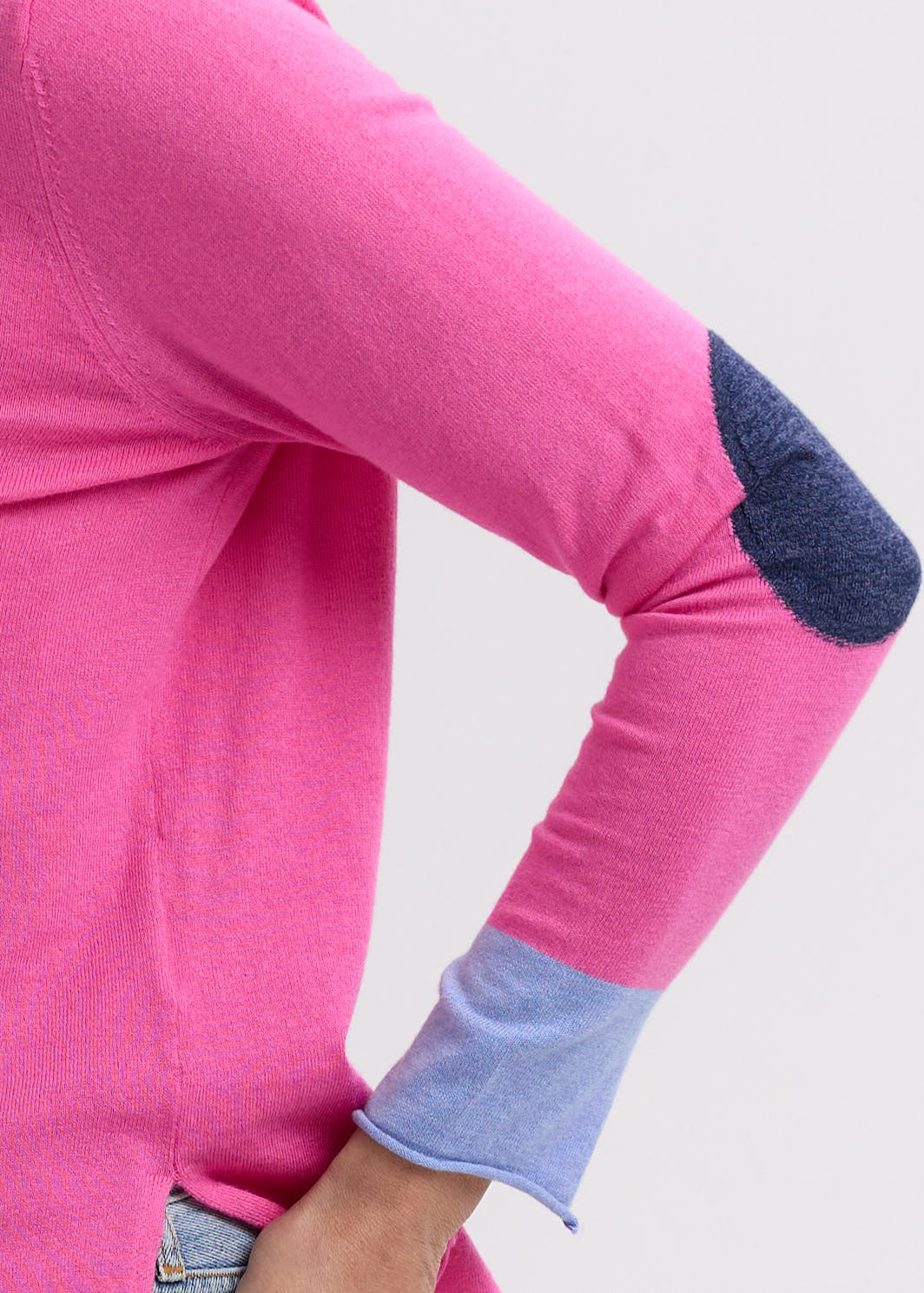Woman wearing the Elbow Patch Jumper by Zaket and Plover in Pink