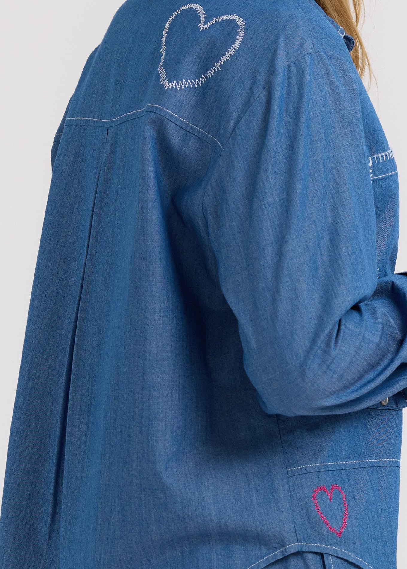 Woman wearing the Hand Work embroidered Denim Shirt by Zaket and Plover