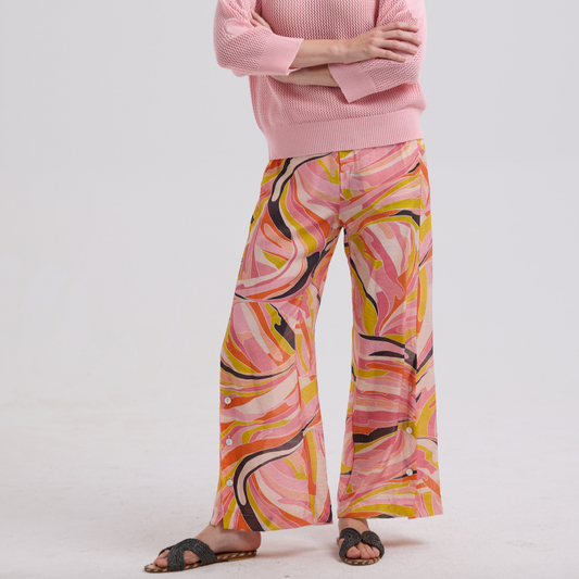 Woman wearing the Summer Pants by Zaket and Plover in Sunset pattern