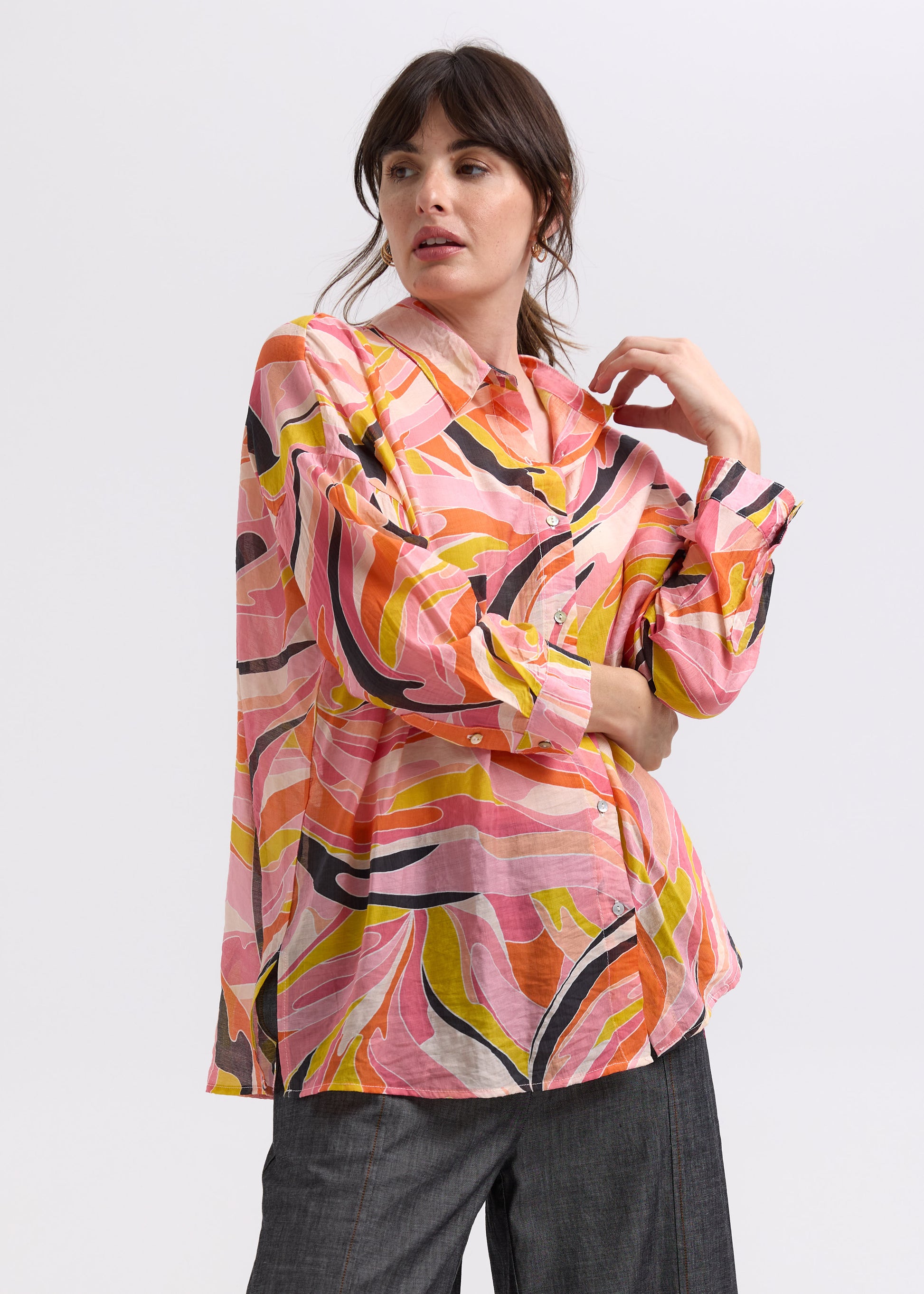Woman wearing the Summer Shirt by Zaket and Plover in Sunset orange