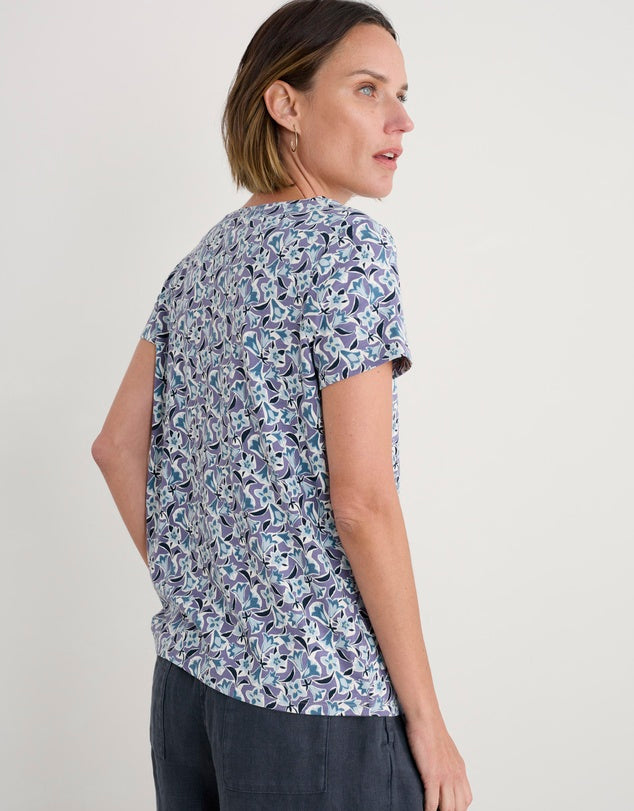 Woman wearing the Appletree Top in Paper Bellflower by SEASALT