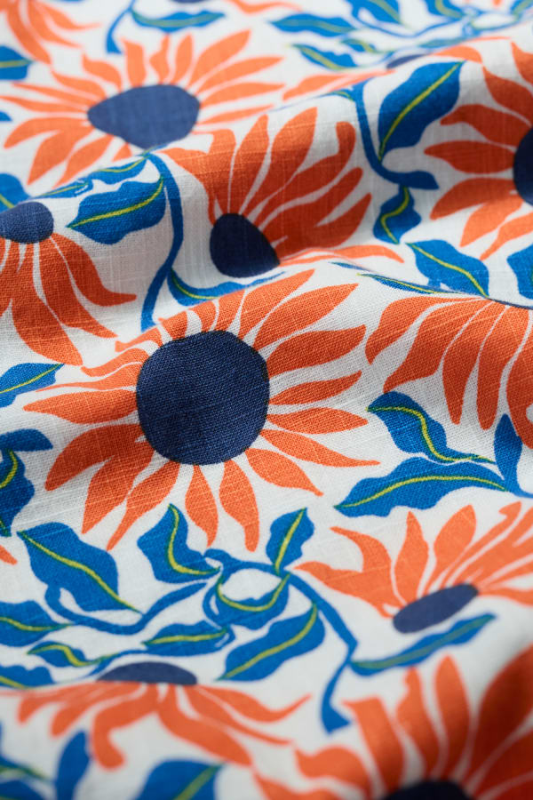 Close up of Sunflower print for the River Cover Dress by SEASALT
