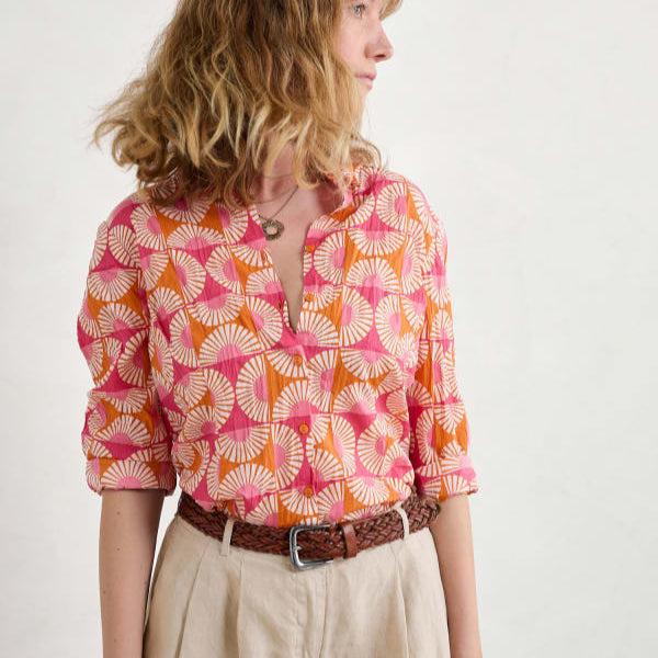 Woman wearing the Larissa Shirt by SEASALT in Geo Marigold