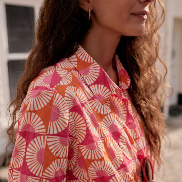 Woman wearing the Larissa Shirt by SEASALT in Geo Marigold