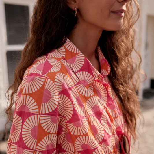 Woman wearing the Larissa Shirt by SEASALT in Geo Marigold