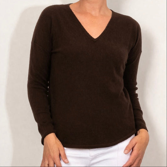 Woman wearing a Vee Neck slim Jumper by Bridge and Lord in chocolate