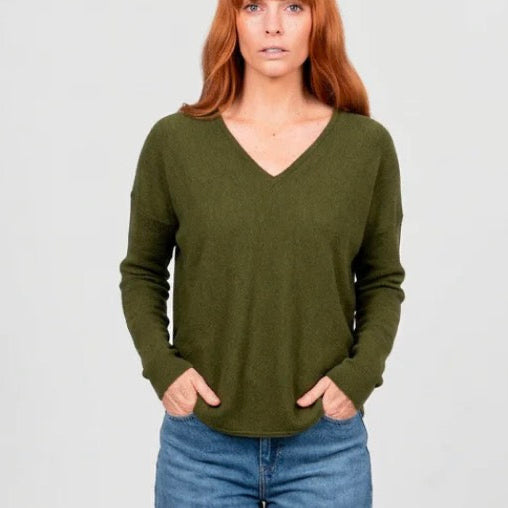 Woman wearing the Bridge and Lord Slim Curved Vee neck Jumper in Olive green