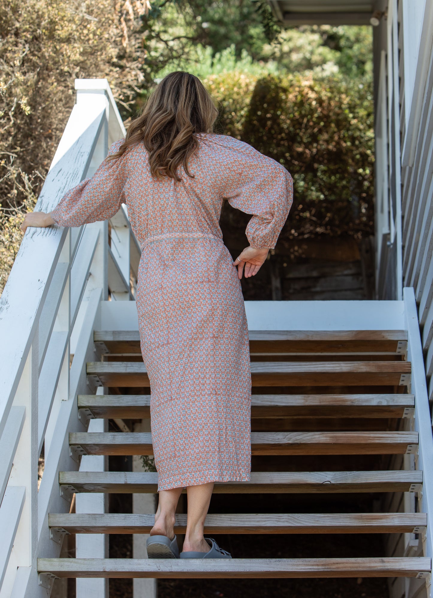 Woman wearing an Organic Cotton dress by Mandalay Designs