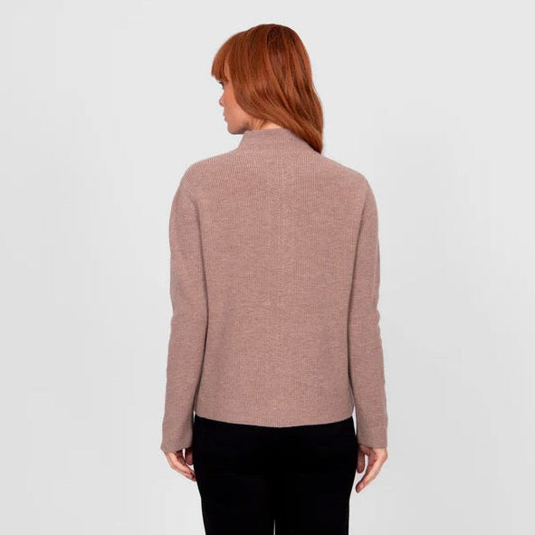 Woman wearing a High crew ribbed brown jumper by Bridge and Lord in Cobblestone