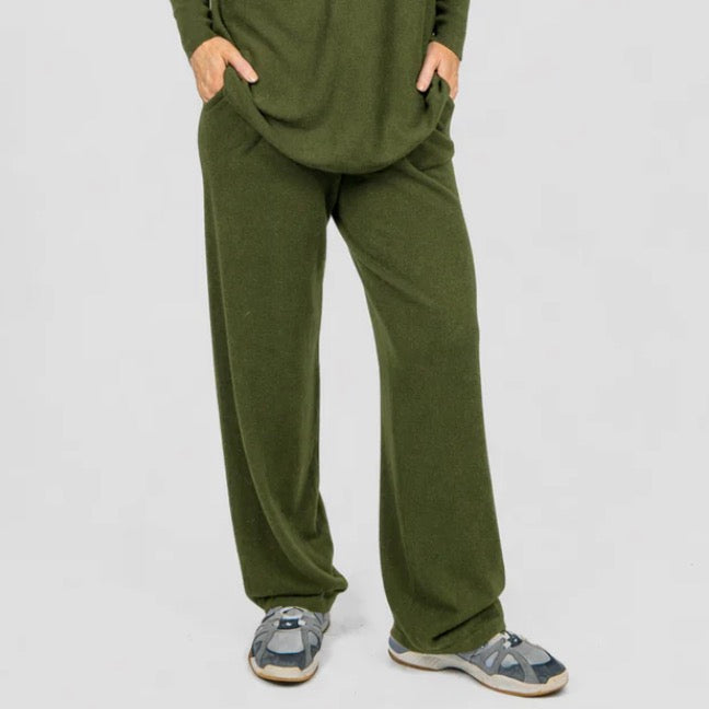 Woman wearing the Bridge and Lord relaxed wide leg pants in olive green