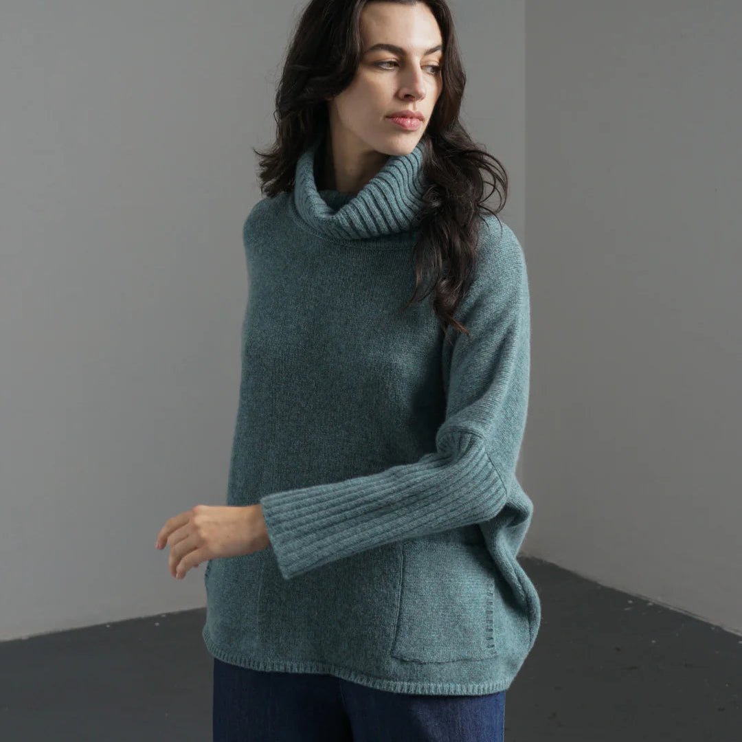 Woman wearing the Bibico Adela Jumper in Caspian blue made with wool