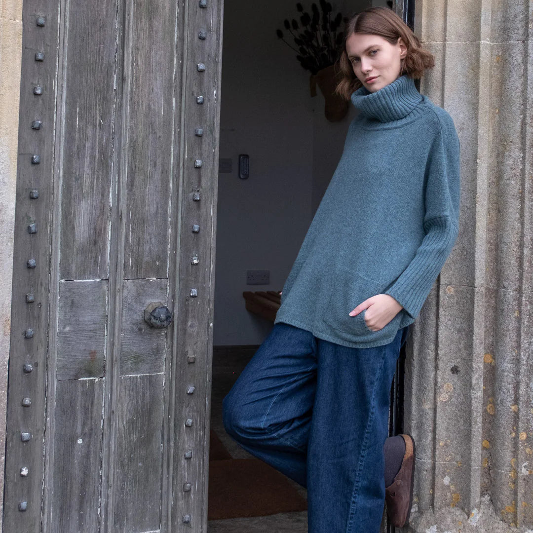 Woman wearing the Bibico Adela Jumper in Caspian blue