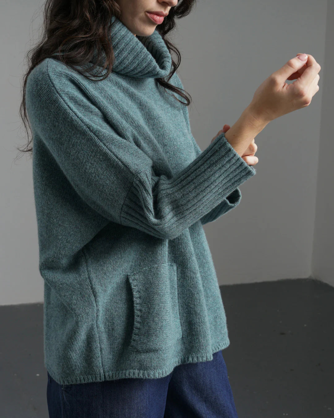 Woman wearing the Bibico Adela turtleneck  Jumper in Caspian made with natural fibres