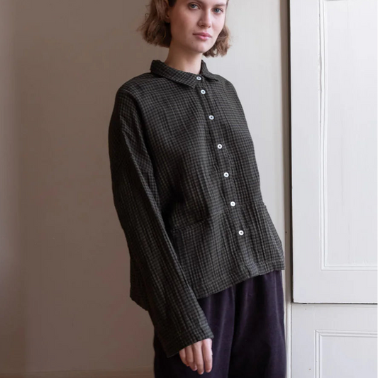 Woman wearing the Bibico Anya cotton plaid shirt in Olive