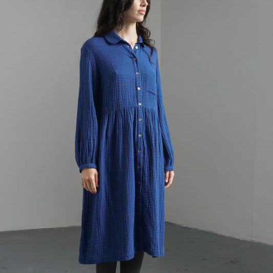 Woman wearing the Bibico Bea cotton midi Shirtdress in Petrol blue Check 