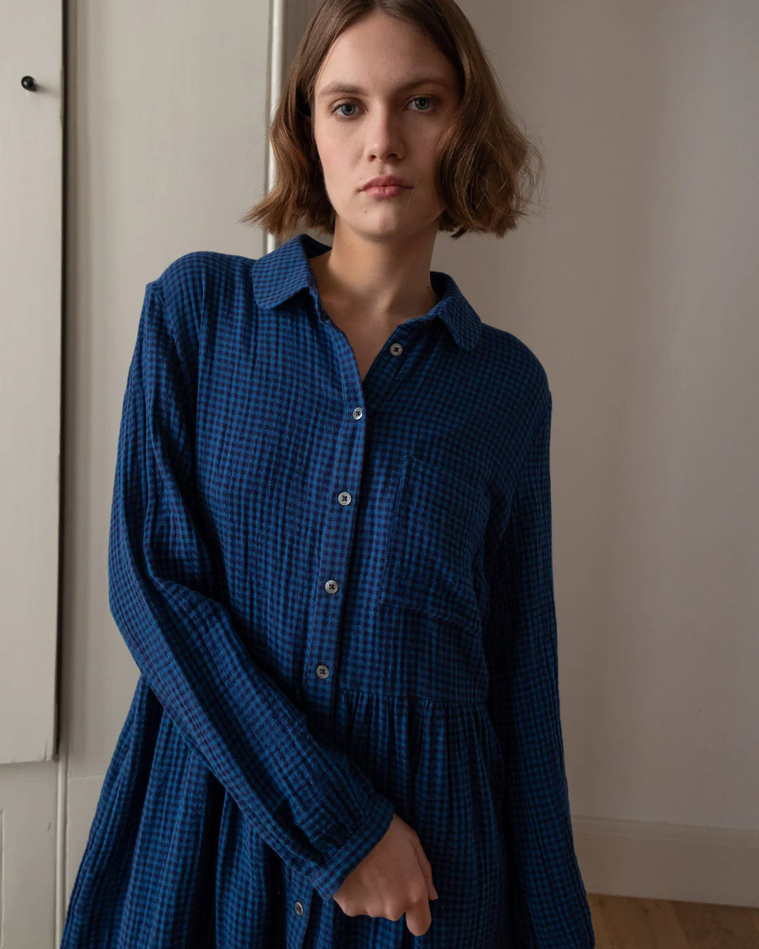 Woman wearing the Bibico Bea Shirtdress in Petrol blue Check 