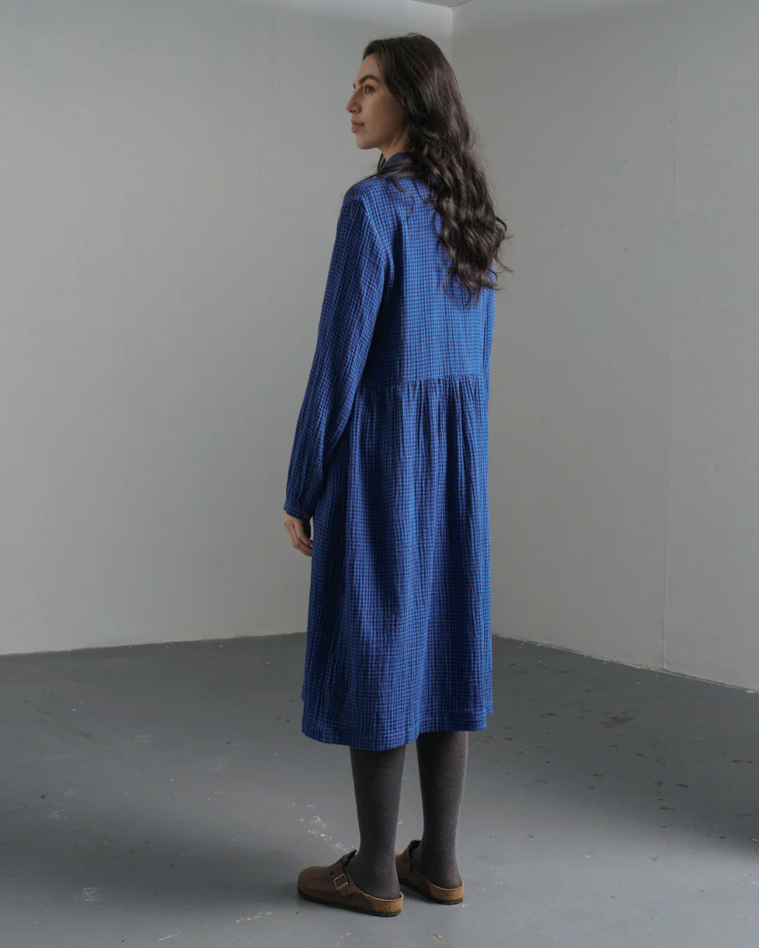 Woman wearing the Bibico Bea midi cotton Shirtdress in Petrol blue plaid pattern