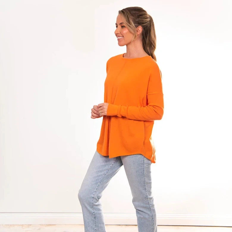 Merino wool jumper for women in orange.