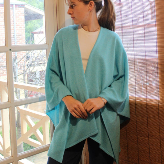 Tiffany blue wool cape from Bridge and lord