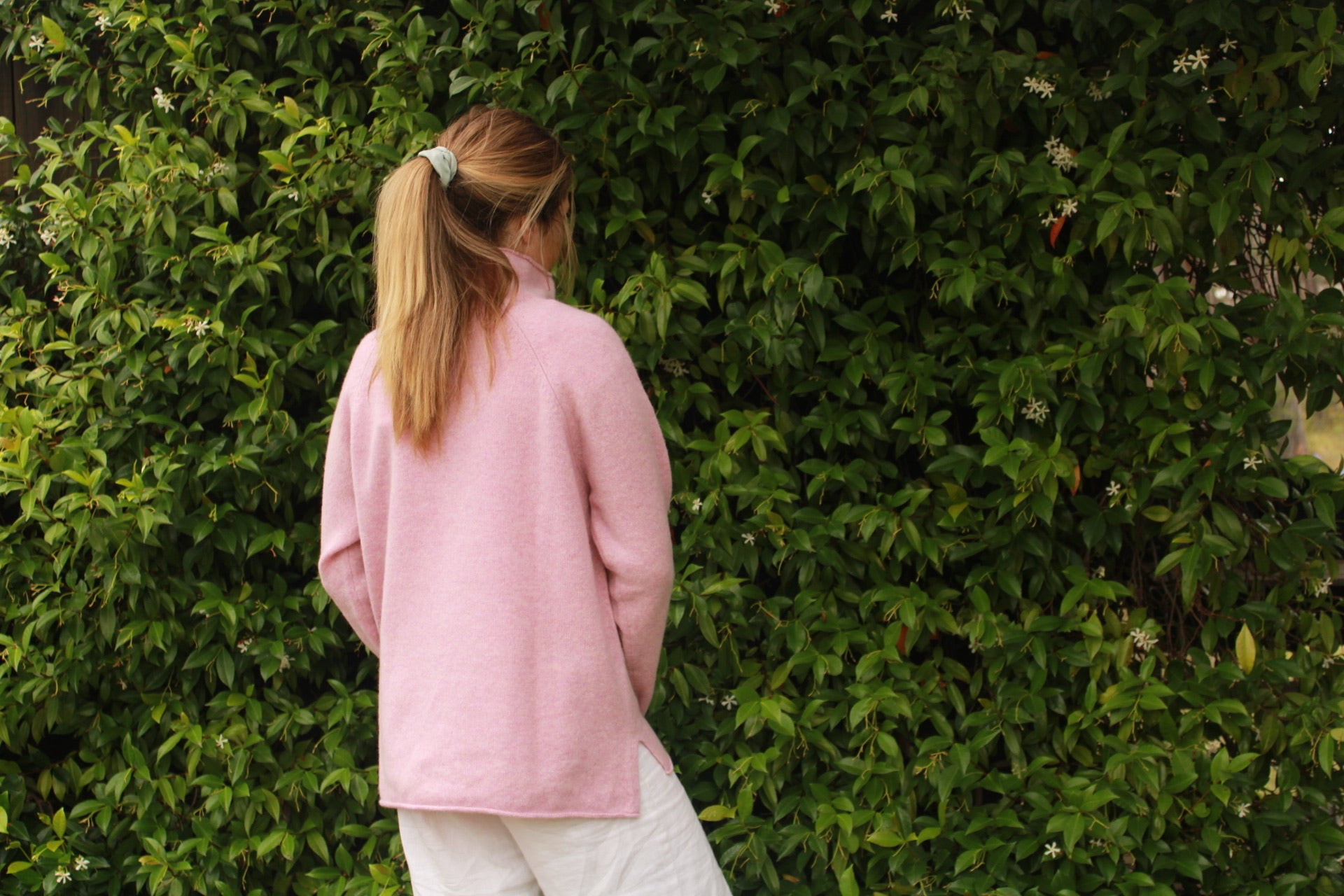 Eribe Corry Raglan Sweater in Pink Haze. Scottish Knitwear, Merino Wool. Back view