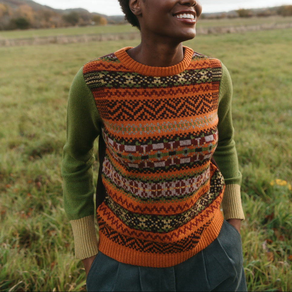 Scottish Knitwear. Quality merino yarn knitted into green and orange jumper.