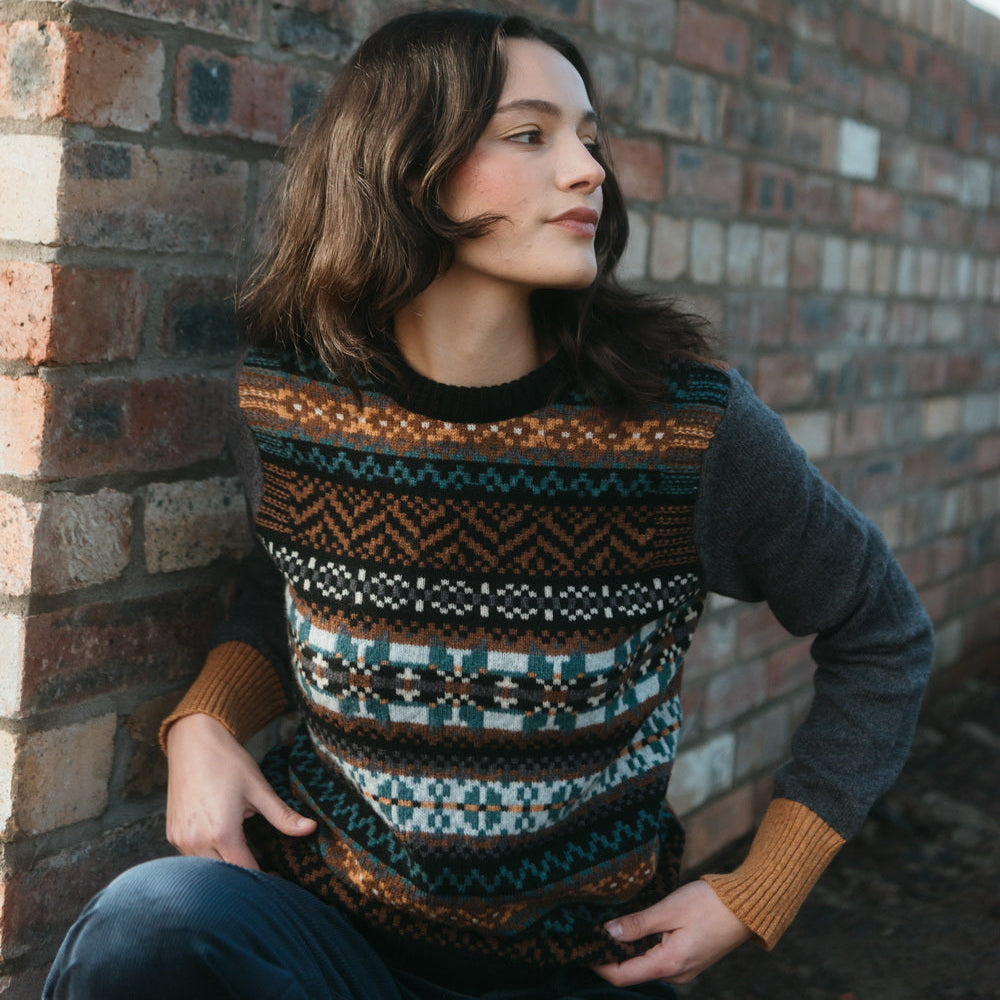 Eribe Stobo graffiti jumper in brown and teal. 