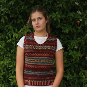 A red sweater vest in fair isle pattern from Eribe
