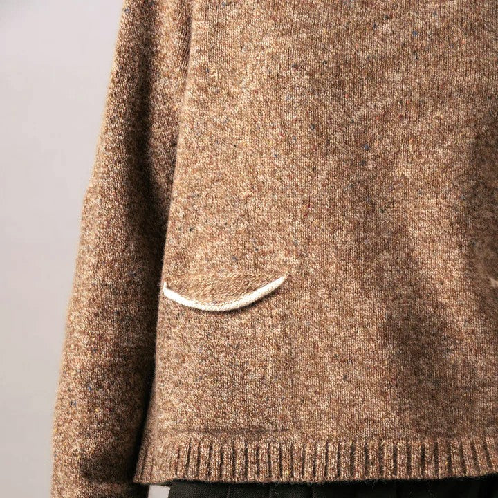 ERibe pocket detail on tweed jumper in desert